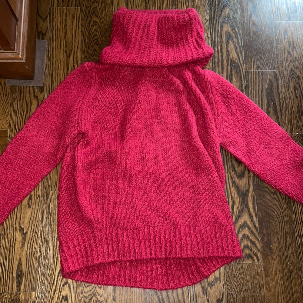 Sara Corsi Red Turtleneck